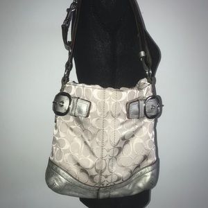 Silver and grey Coach crossbody
